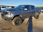 ✅ 2020 Chevrolet Colorado 4WD ZR2 • VIN: 1GCGTEEN2L1245906 • Lot: 94705905. Listed on Copart with 90,402 mi. Free auction sales archive from the USA and detailed vehicle history report at DreamBid. Image 1.