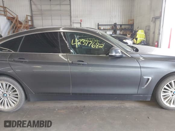 ✅ 2015 BMW 4 Series 428i xDrive • VIN: WBA4A7C52FD414734 • Lot: 42377682. Listed on IAAI with 129,264 mi. Free auction sales archive from the USA and detailed vehicle history report at DreamBid. Image 13.
