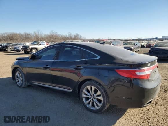 2014 Hyundai Azera Limited z VIN KMHFH4JG1EA410812, wystawiony jako Copart lot #83031084 z przebiegiem 147 615 mil mil oraz Szkoda całkowita • Salvage title. Historia ofert i sprzedaży dostępna na DreamBid. Obrazek 2.