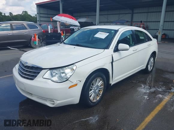 ✅ 2009 Chrysler Sebring Touring • VIN: 1C3LC56B19N507472 • Lot: 43023773. Listed on IAAI with 154,381 mi. Free auction sales archive from the USA and detailed vehicle history report at DreamBid. Image 2.