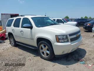 2013 Chevrolet Tahoe LTZ z VIN 1GNSKCE07DR266766, wystawiony jako IAAI lot #39812395 z przebiegiem 146 366 mil mil oraz . Historia ofert i sprzedaży dostępna na DreamBid. Obrazek 1.