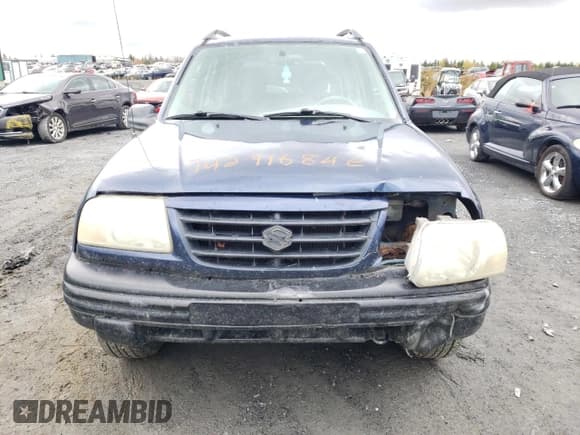 ✅ 2004 Suzuki Vitara • VIN: 2S3TD62VX46100019 • Lot: 74291684. Wystawiony na Copart z przebiegiem 148 566 mil. Bezpłatny archiwum sprzedaży aukcyjnych z USA i szczegółowy raport historii pojazdu na DreamBid. Zdjęcie 5.