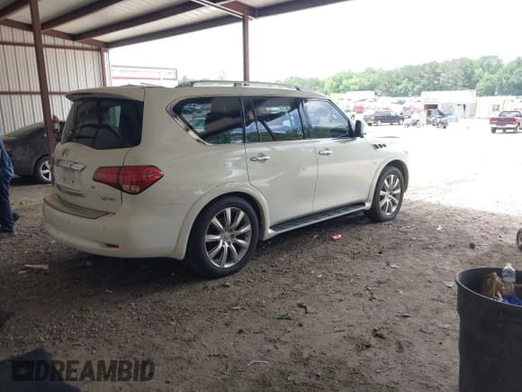 ✅ 2014 Infiniti QX80 • VIN: JN8AZ2NEXE9065228 • Lot: 42639871. Listed on IAAI with 156,957 mi. Free auction sales archive from the USA and detailed vehicle history report at DreamBid. Image 4.