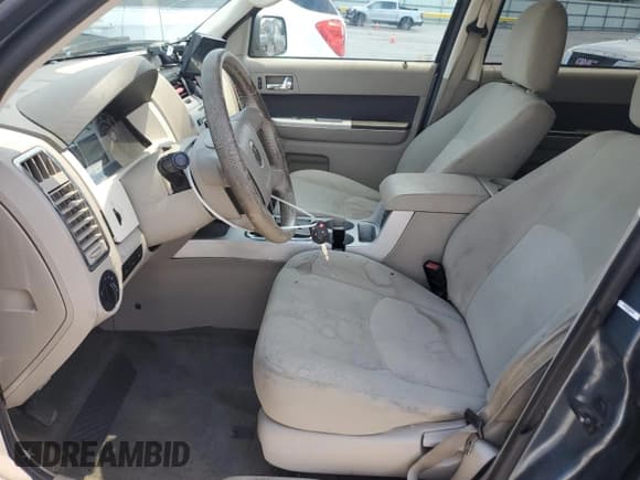 ✅ 2010 Mercury Mariner • VIN: 4M2CN9B70AKJ08597 • Lot: 63486595. Wystawiony na Copart z przebiegiem 113 207 mil. Bezpłatny archiwum sprzedaży aukcyjnych z USA i szczegółowy raport historii pojazdu na DreamBid. Zdjęcie 7.