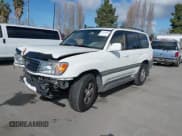 ✅ 2001 Toyota Land Cruiser • VIN: JTEHT05J412011211 • Lot: 41978366. Listed on IAAI with 183,684 mi. Free auction sales archive from the USA and detailed vehicle history report at DreamBid. Image 2.