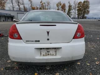 ✅ 2009 Pontiac G6 1SA • VIN: 1G2ZG57B594186734 • Lot: 90953235. Wystawiony na Copart z przebiegiem 168 398 mil. Bezpłatny archiwum sprzedaży aukcyjnych z USA i szczegółowy raport historii pojazdu na DreamBid. Zdjęcie 6.