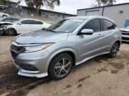 ✅ 2020 Honda HR-V Touring • VIN: 3CZRU6H98LM734415 • Лот: 69144125. Опубликован ранее на Copart с пробегом 34 479 миль. Бесплатный доступ к архиву аукционных продаж из США и подробный отчёт об истории автомобиля на DreamBid. Изображение 1.