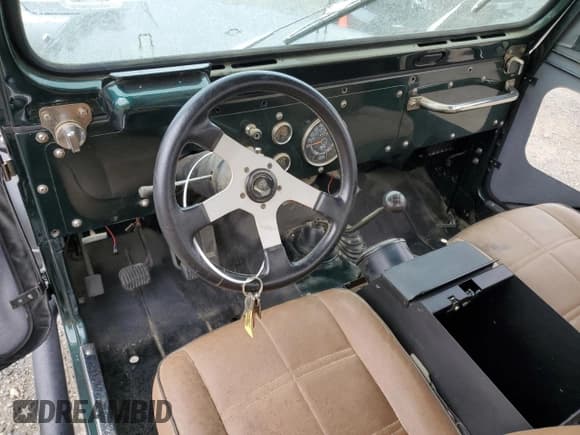 ✅ 1978 Jeep CJ • VIN: J8M83AA111044 • Лот: 57285815. Опубликован ранее на Copart с пробегом 64 622 миль. Бесплатный доступ к архиву аукционных продаж из США и подробный отчёт об истории автомобиля на DreamBid. Изображение 8.