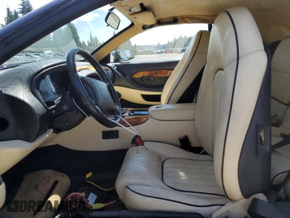 ✅ 1997 Aston Martin DB7 • VIN: SCFAA4127VK201612 • Lot: 68822245. Wystawiony na Copart z przebiegiem 25 730 mil. Bezpłatny archiwum sprzedaży aukcyjnych z USA i szczegółowy raport historii pojazdu na DreamBid. Zdjęcie 7.