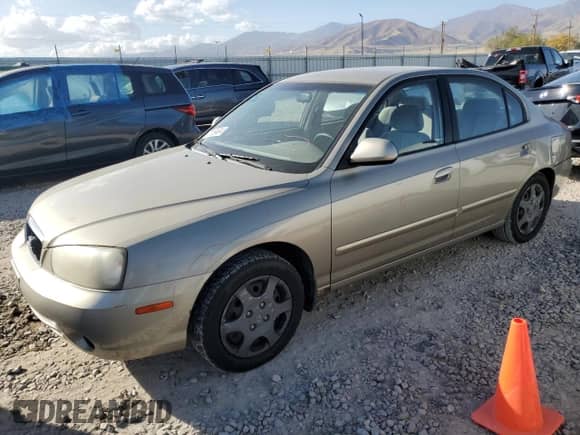 2002 Hyundai Elantra GLS z VIN KMHDN45D22U434479, wystawiony jako Copart lot #77869634 z przebiegiem 231 962 mil mil oraz Szkoda całkowita • Salvage title. Historia ofert i sprzedaży dostępna na DreamBid. Obrazek 1.