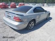 ✅ 1995 Ford Mustang • VIN: 1FALP4047SF170414 • Lot: 42079990. Listed on IAAI with 106,398 mi. Free auction sales archive from the USA and detailed vehicle history report at DreamBid. Image 4.