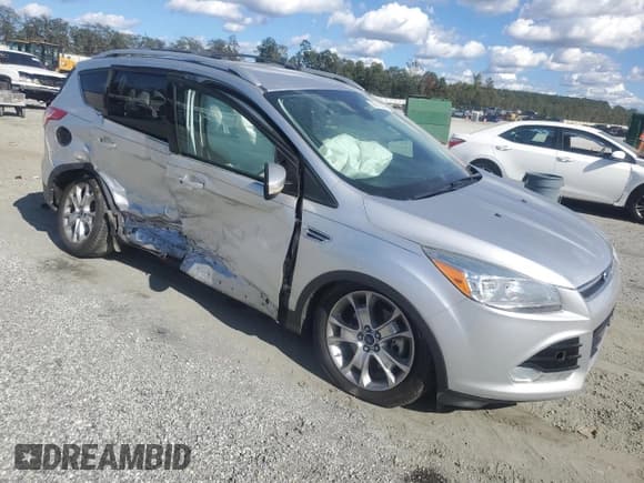 ✅ 2014 Ford Escape Titanium • VIN: 1FMCU0J98EUD24758 • Лот: 86516345. Опубликован ранее на Copart с пробегом 132 126 миль. Бесплатный доступ к архиву аукционных продаж из США и подробный отчёт об истории автомобиля на DreamBid. Изображение 4.
