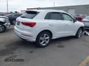 ✅ 2021 Audi Q3 Premium • VIN: WA1AUCF39M1068531 • Lot: 42289153. Wystawiony na IAAI z przebiegiem 96 275 mil. Bezpłatny archiwum sprzedaży aukcyjnych z USA i szczegółowy raport historii pojazdu na DreamBid. Zdjęcie 4.