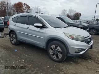 ✅ 2015 Honda CR-V Touring • VIN: 5J6RM4H97FL109658 • Лот: 92275355. Опубликован ранее на Copart с пробегом 55 512 миль. Бесплатный доступ к архиву аукционных продаж из США и подробный отчёт об истории автомобиля на DreamBid. Изображение 4.