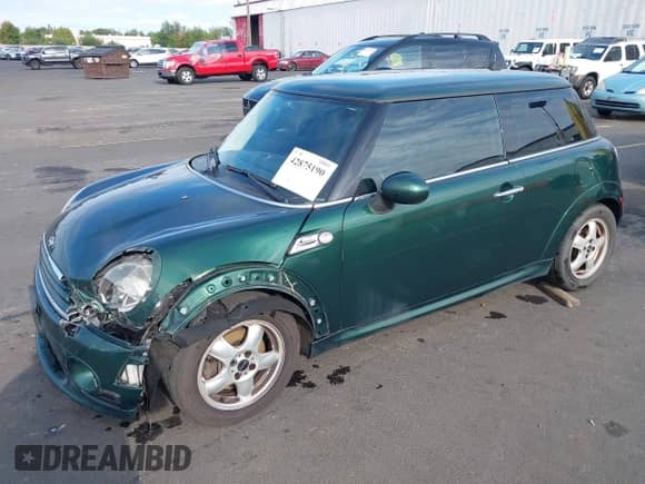 2011 MINI Hardtop with VIN WMWSU3C58BT091720, listed as a IAAI auction lot 42875190 with 60,918 mi miles and . Bid and sale history available at DreamBid. Image 2.