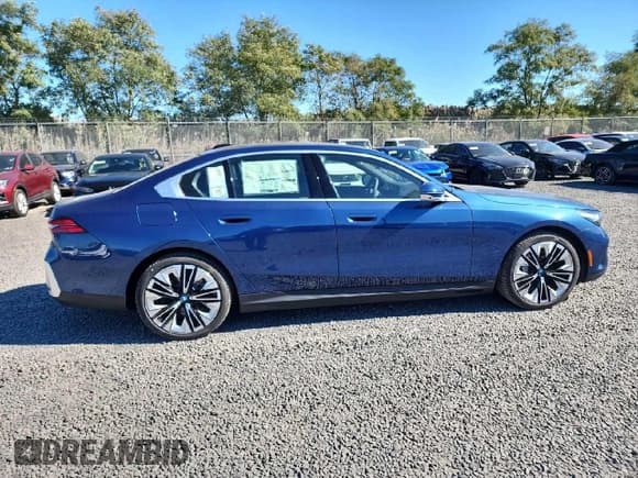 ✅ 2024 BMW i5 eDrive40 • VIN: WBY33FK05RCR56573 • Lot: 76009714. Listed on Copart with 241 mi. Free auction sales archive from the USA and detailed vehicle history report at DreamBid. Image 4.