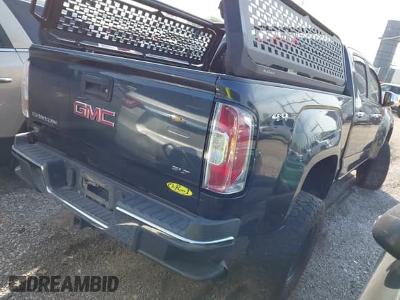 ✅ 2017 GMC Canyon 4WD SLT • VIN: 1GTP6DE17H1213698 • Lot: 42559028. Listed on IAAI with 169,292 mi. Free auction sales archive from the USA and detailed vehicle history report at DreamBid. Image 4.