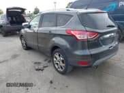 ✅ 2015 Ford Escape Titanium • VIN: 1FMCU0JX8FUB71346 • Lot: 43558511. Listed on IAAI with 127,729 mi. Free auction sales archive from the USA and detailed vehicle history report at DreamBid. Image 3.