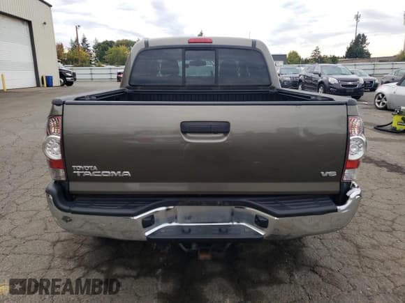 ✅ 2011 Toyota Tacoma • VIN: 3TMLU4EN1BM057479 • Lot: 85938495. Listed on Copart with 86,574 mi. Free auction sales archive from the USA and detailed vehicle history report at DreamBid. Image 6.