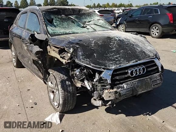 ✅ 2018 Audi Q3 Premium • VIN: WA1ECCFS3JR027854 • Лот: 85929255. Опубликован ранее на Copart с пробегом Не указан. Бесплатный доступ к архиву аукционных продаж из США и подробный отчёт об истории автомобиля на DreamBid. Изображение 13.