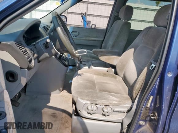 ✅ 2004 Kia Sedona LX • VIN: KNDUP131346493862 • Lot: 57237605. Listed on Copart with 230,104 mi. Free auction sales archive from the USA and detailed vehicle history report at DreamBid. Image 7.