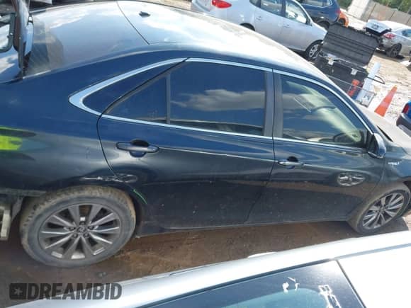 2015 Toyota Camry LE with VIN 4T1BD1FK0FU171355, listed as a IAAI auction lot 43313133 with 219,133 mi miles and . Bid and sale history available at DreamBid. Image 14.