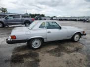 ✅ 1989 Mercedes-Benz 560 SL • VIN: WDBBA48D3KA103641 • Lot: 65051325. Wystawiony na Copart z przebiegiem 125 249 mil. Bezpłatny archiwum sprzedaży aukcyjnych z USA i szczegółowy raport historii pojazdu na DreamBid. Zdjęcie 3.