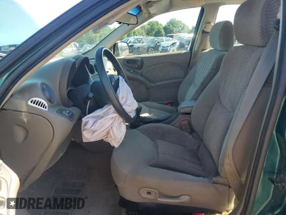 ✅ 1999 Pontiac Grand Am SE1 • VIN: 1G2NE52E6XC503882 • Lot: 64674975. Listed on Copart with 122,813 mi. Free auction sales archive from the USA and detailed vehicle history report at DreamBid. Image 7.