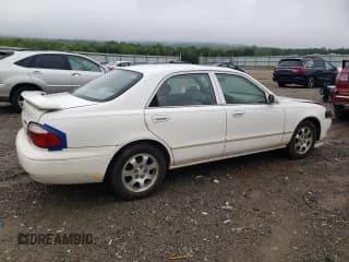✅ 2001 Mazda 626 LX • VIN: 1YVGF22C515251837 • Лот: 56854605. Опубликован ранее на Copart с пробегом 173 148 миль. Бесплатный доступ к архиву аукционных продаж из США и подробный отчёт об истории автомобиля на DreamBid. Изображение 3.