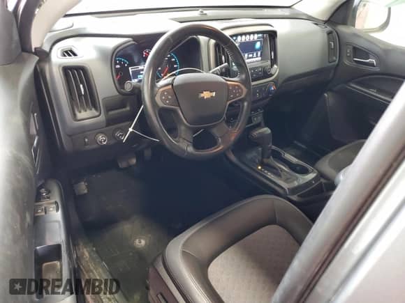 2018 Chevrolet Colorado 4WD Z71 with VIN 1GCHTDEN1J1284367, listed as a Copart auction lot 77316824 with 43,383 mi miles and Salvage title. Bid and sale history available at DreamBid. Image 8.