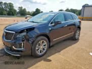 ✅ 2022 Cadillac XT5 FWD Premium Luxury • VIN: 1GYKNCRS1NZ149644 • Lot: 67741245. Listed on Copart with 36,676 mi. Free auction sales archive from the USA and detailed vehicle history report at DreamBid. Image 1.