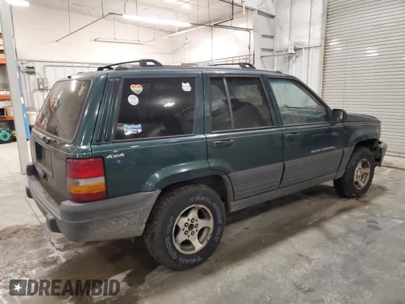 ✅ 1996 Jeep Grand Cherokee Laredo • VIN: 1J4GZ58S9TC198257 • Lot: 93327175. Listed on Copart with 169,183 mi. Free auction sales archive from the USA and detailed vehicle history report at DreamBid. Image 3.