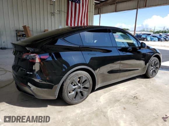 ✅ 2024 Tesla Model Y Long Range • VIN: 7SAYGAEE2RF212375 • Lot: 86433265. Listed on Copart with 14,265 mi. Free auction sales archive from the USA and detailed vehicle history report at DreamBid. Image 3.