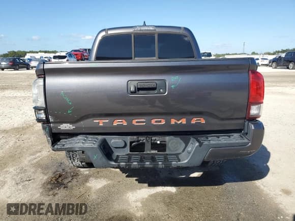 ✅ 2019 Toyota Tacoma SR5 • VIN: 5TFAX5GN5KX161579 • Лот: 90804775. Опубликован ранее на Copart с пробегом 90 045 миль. Бесплатный доступ к архиву аукционных продаж из США и подробный отчёт об истории автомобиля на DreamBid. Изображение 6.
