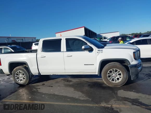 ✅ 2016 GMC Sierra 1500 SLE • VIN: 3GTU2MEC0GG133837 • Лот: 43433484. Опубликован ранее на IAAI с пробегом 249 281 миль. Бесплатный доступ к архиву аукционных продаж из США и подробный отчёт об истории автомобиля на DreamBid. Изображение 13.