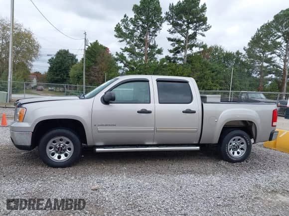 2009 GMC Sierra 1500 SL with VIN 3GTEC13C69G108219, listed as a IAAI auction lot 43523560 with 198,590 mi miles and . Bid and sale history available at DreamBid. Image 14.