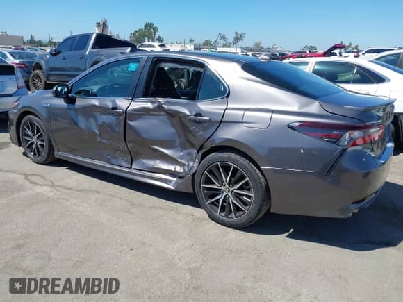 2021 Toyota Camry Hybrid SE z VIN 4T1G31AK6MU551359, wystawiony jako IAAI lot #42995923 z przebiegiem 54 373 mil mil oraz . Historia ofert i sprzedaży dostępna na DreamBid. Obrazek 3.