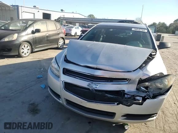 ✅ 2010 Chevrolet Malibu 1LS • VIN: 1G1ZB5EBXAF161536 • Lot: 76058784. Listed on Copart with 151,574 mi. Free auction sales archive from the USA and detailed vehicle history report at DreamBid. Image 11.