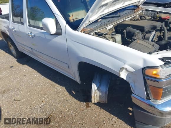 ✅ 2012 GMC Canyon SLE1 • VIN: 1GTD5MF91C8117334 • Lot: 41221214. Listed on IAAI with 150,030 mi. Free auction sales archive from the USA and detailed vehicle history report at DreamBid. Image 6.