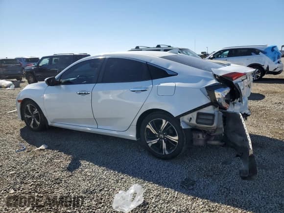 ✅ 2017 Honda Civic Touring • VIN: 2HGFC1F91HH654110 • Lot: 90936485. Listed on Copart with 114,224 mi. Free auction sales archive from the USA and detailed vehicle history report at DreamBid. Image 2.