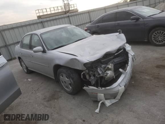 2001 Chevrolet Malibu LS with VIN 1G1NE52J916227544, listed as a Copart auction lot 71095404 with 136,767 mi miles and Salvage title. Bid and sale history available at DreamBid. Image 4.