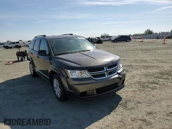 2017 Dodge Journey SE with VIN 3C4PDCAB3HT551168, listed as a Copart auction lot 71287445 with 148,553 mi miles and Salvage title. Bid and sale history available at DreamBid. Image 14.