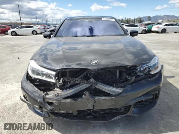 ✅ 2018 BMW 7 Series 750i • VIN: WBA7F0C5XJGM23016 • Лот: 51284255. Опубликован ранее на Copart с пробегом 69 460 миль. Бесплатный доступ к архиву аукционных продаж из США и подробный отчёт об истории автомобиля на DreamBid. Изображение 5.