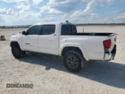 ✅ 2023 Toyota Tacoma SR5 • VIN: 3TYAZ5CN8PT041924 • Lot: 85926705. Listed on Copart with 34,678 mi. Free auction sales archive from the USA and detailed vehicle history report at DreamBid. Image 2.