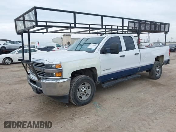 ✅ 2015 Chevrolet Silverado 2500HD Work Truck • VIN: 1GC2CUEG6FZ559215 • Лот: 43844626. Опубликован ранее на IAAI с пробегом 200 462 миль. Бесплатный доступ к архиву аукционных продаж из США и подробный отчёт об истории автомобиля на DreamBid. Изображение 2.