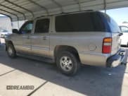 ✅ 2003 Chevrolet Suburban LS • VIN: 1GNEC16T33J262864 • Лот: 61648255. Опубликован ранее на Copart с пробегом 298 652 миль. Бесплатный доступ к архиву аукционных продаж из США и подробный отчёт об истории автомобиля на DreamBid. Изображение 2.