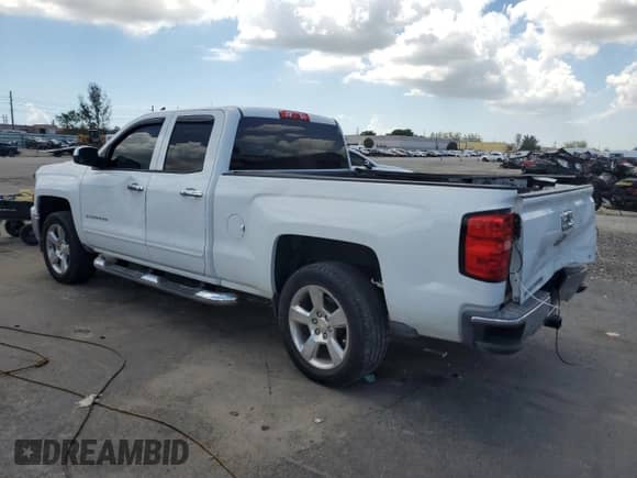 2015 Chevrolet Silverado 1500 LT with VIN 1GCRCREC8FZ362782, listed as a Copart auction lot 69407325 with 34,390 mi miles and Salvage title. Bid and sale history available at DreamBid. Image 2.