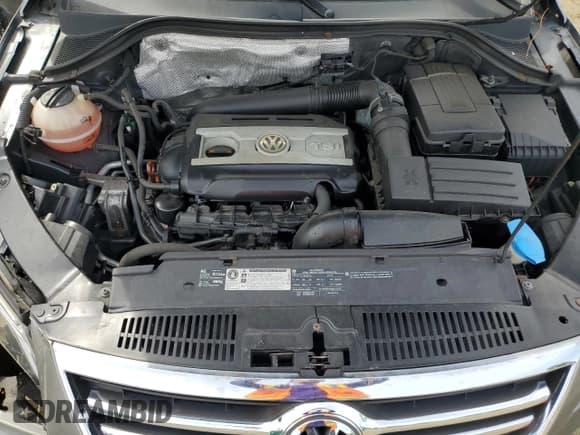 ✅ 2011 Volkswagen Tiguan S • VIN: WVGBV7AX0BW516062 • Lot: 84602025. Listed on Copart with 68,613 mi. Free auction sales archive from the USA and detailed vehicle history report at DreamBid. Image 12.