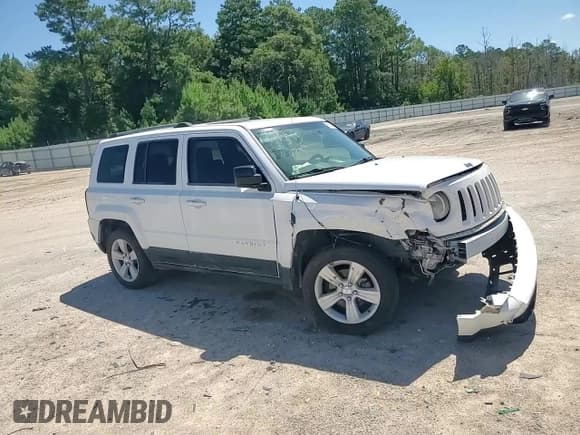 ✅ 2011 Jeep Patriot Latitude X • VIN: 1J4NT4GB0BD109575 • Lot: 66358555. Listed on Copart with 169,538 mi. Free auction sales archive from the USA and detailed vehicle history report at DreamBid. Image 14.