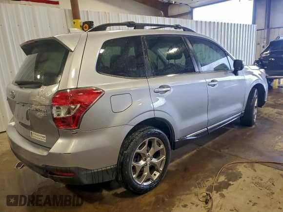 ✅ 2016 Subaru Forester Touring • VIN: JF2SJAXC7GH445408 • Lot: 93864225. Listed on Copart with 145,116 mi. Free auction sales archive from the USA and detailed vehicle history report at DreamBid. Image 3.